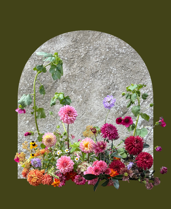 Abundant meadow arrangement for a wedding featuring locally grown British fresh and dried flowers, set out in a gradient from light to dark