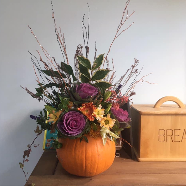 Halloween pumpkin flower arrangement